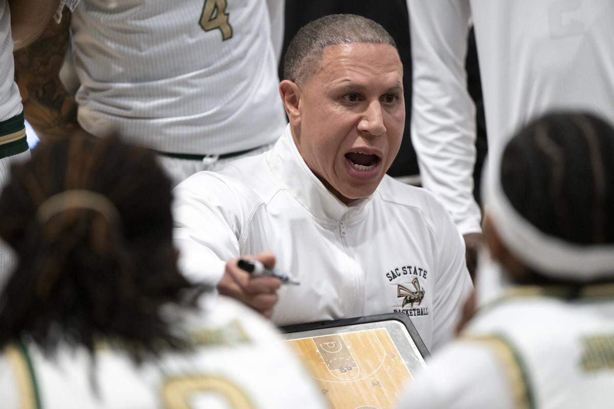 Sacramento State coach Mike Bibby talks to his players during a timeout during a game between Sac State and Presbyterian at Hornet Pavilion in Sacramento on Sunday, Nov. 16, 2025. The Hornets this Thursday will play their first home game since Nov. 25.
