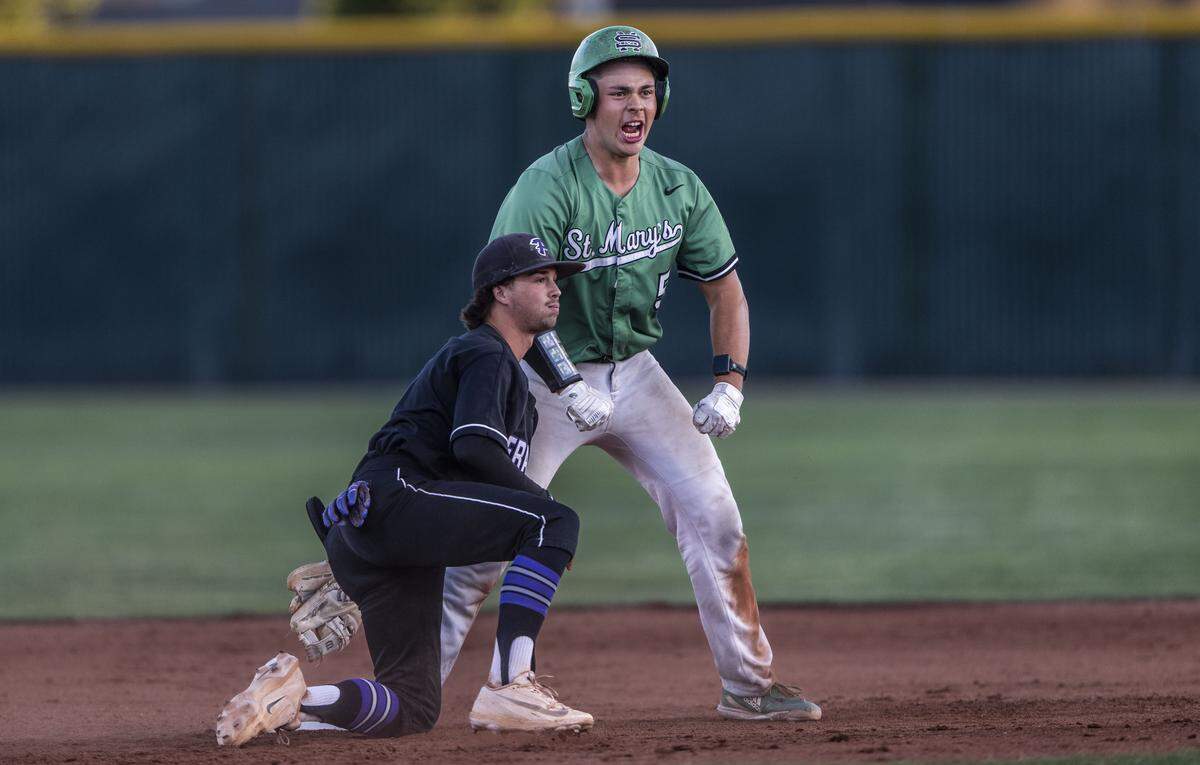 St. Mary's Rams catcher Maddox Rabara celebrates a two-run double in the sixth inning against the Franklin Wildcats during the CIF Sac-Joaquin Section Division I baseball championship Friday at Sacramento City College.