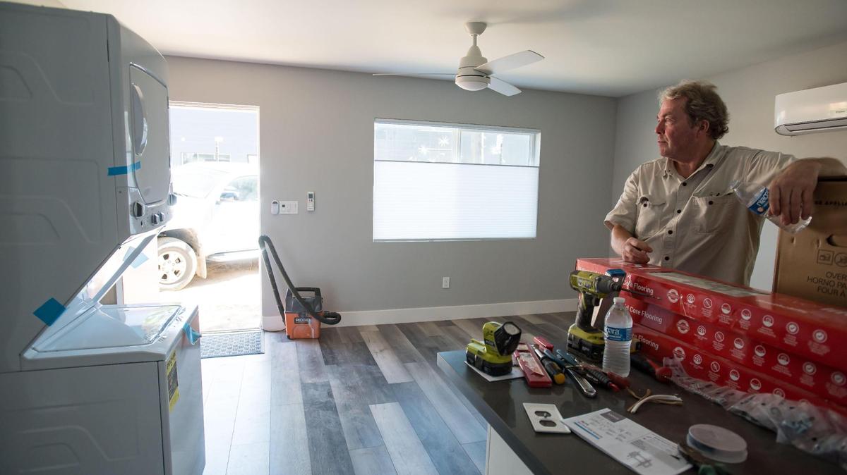 George Warren is in the process of furnishing his two ADUs — accessory dwelling units — on his midtown property July 13, 2023, in Sacramento. Anchored Tiny Homes, founded in 2019, is building the units for Warren, who said he’s been impressed by the craftsmanship and work done by the company’s hired contractors.