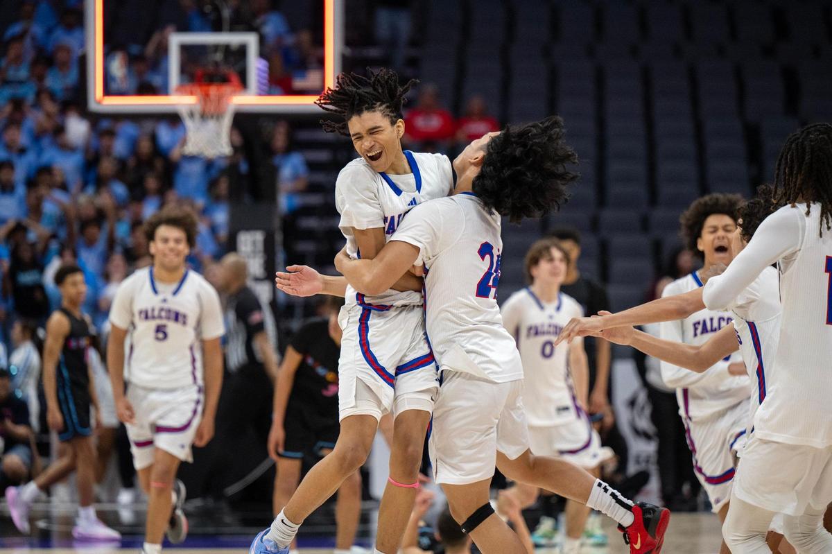The Christian Brothers Falcons’ Andre Rabb-patterson (4) is embraced a teammate after defeating the El Capitan Gauchos for the CIF Sac-Joaquin Section Championship Division III championship on Friday, Feb. 28, 2025, at Golden 1 Center.