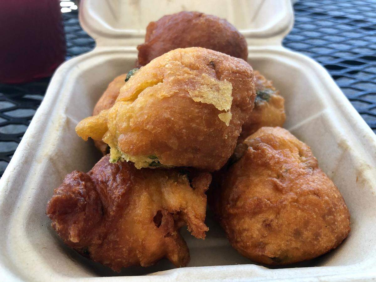 Cafe Connection’s pholourie are fried dough balls filled with chickpeas, yellow split peas and spinach.