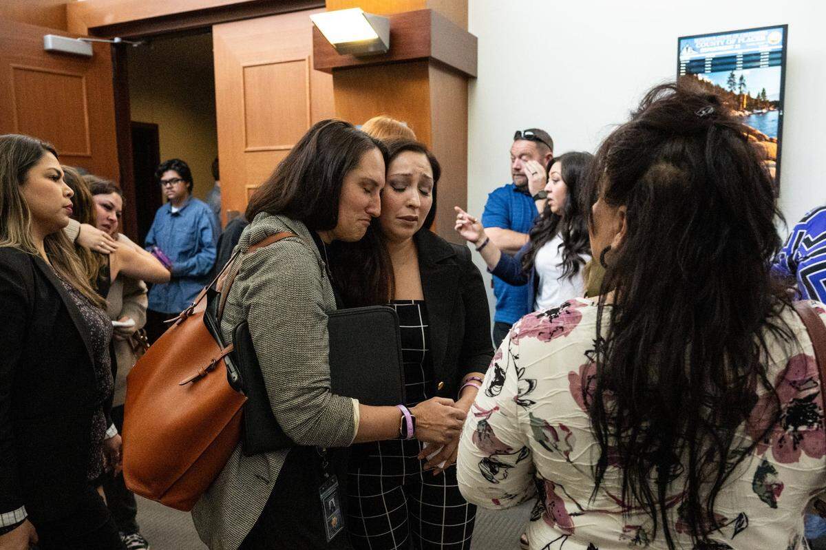 Regina Leah Chavez, center, the mother of victim Jewels Marie Wolf, is comforted by Stephanie Herrera, left, after the 2023 sentencing of Nathaniel Evan Cabacungan for second-degree murder for the fentanyl death of her daughter at Placer Superior Court.
