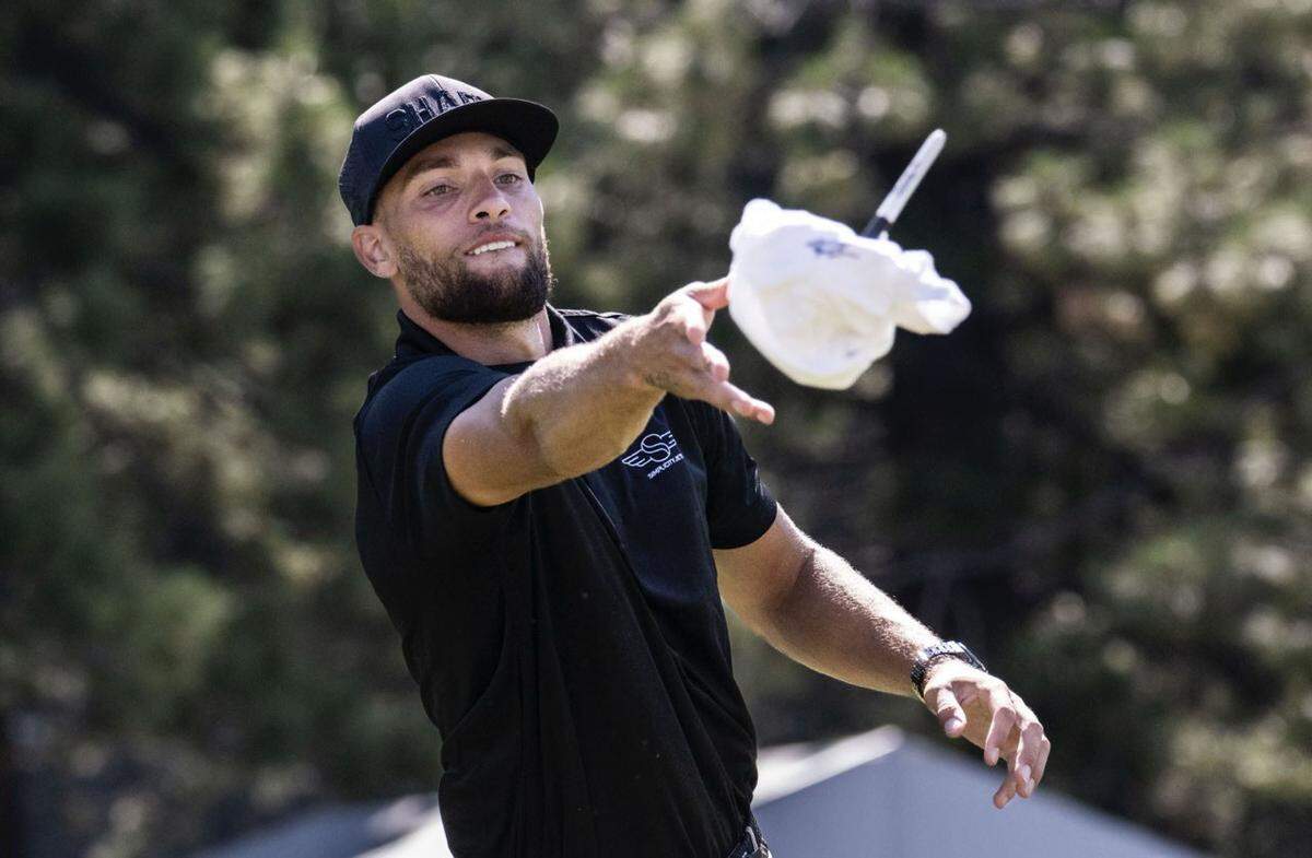Sacramento Kings player Zach Lavine throws a signed shirt to a fan during the last day of the American Century celebrity golf tournament at at Edgewood Tahoe Resort in Stateline, Nev., on Sunday. Retired NHL All Star Joe Pavelski finished at the top of the leaderboard in the event, followed by Hall of Fame Atlanta Braves pitcher John Smoltz. The Golden State Warriors’ Stephen Curry, who won the tourney in 2023, finished in fifth place after a double bogey on the final hole.