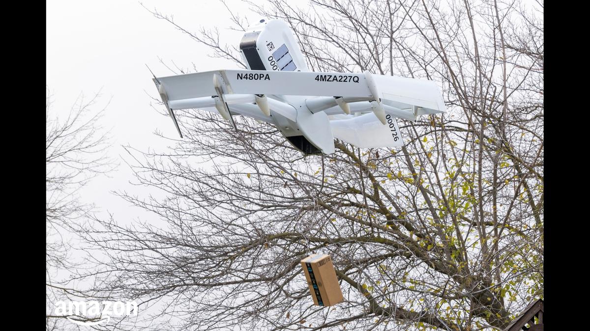 An Amazon Prime Air drone is seen carrying a small package in an undated photo.