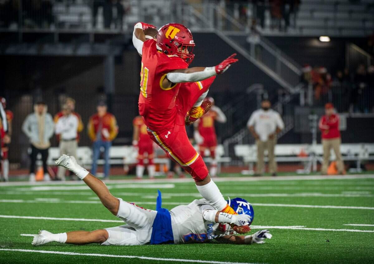Folsom’s Greco Carrillo takes down Cathedral Catholic’s Noah Allen on Friday, Dec. 10, 2021.