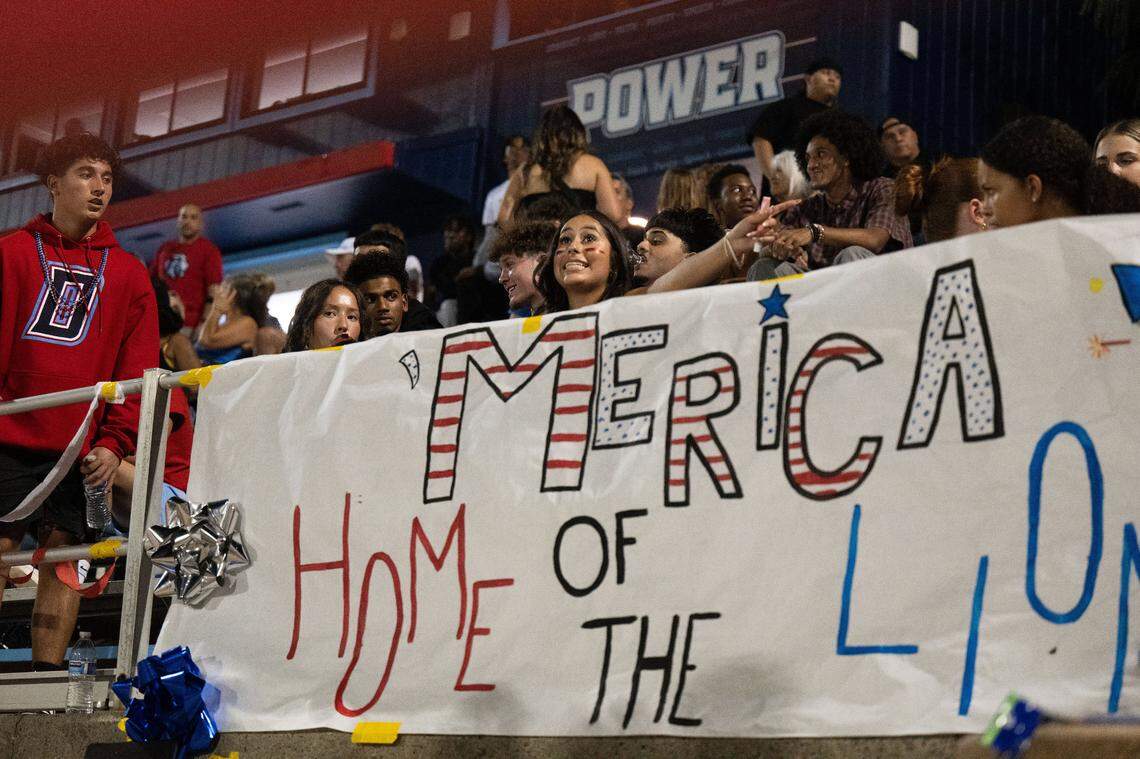 A sign in the Destiny Christian stands reads “’Merica: Home of the Lions” on Friday.