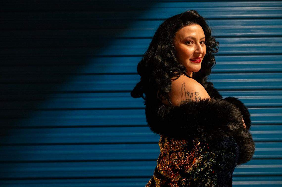 Deaja Joy of The Darling Clementines burlesque and drag troupe poses for a photograph in their Old Sacramento rehearsal space earlier this month.