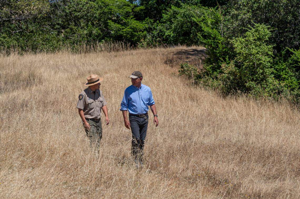 California State Parks Bay Area district superintendent Matthew Allen, left, walks with parks Director Armando Quintero on July 15 at Mount Tamalpais State Park. When Quintero started his parks career in 1997 with the National Park Service, he faced constant reminders of being a Latino in an overwhelmingly white profession. The parks system still has a long way to go in creating a workforce that reflects the California’s diversity.