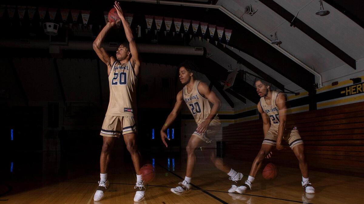 Elk Grove’s Ameere Britton goes up for a basket in this multiple exposure photo illustration on March 27 at the Elk Grove High School gym. Britton is The Bee’s boys’ basketball Player of the Year.