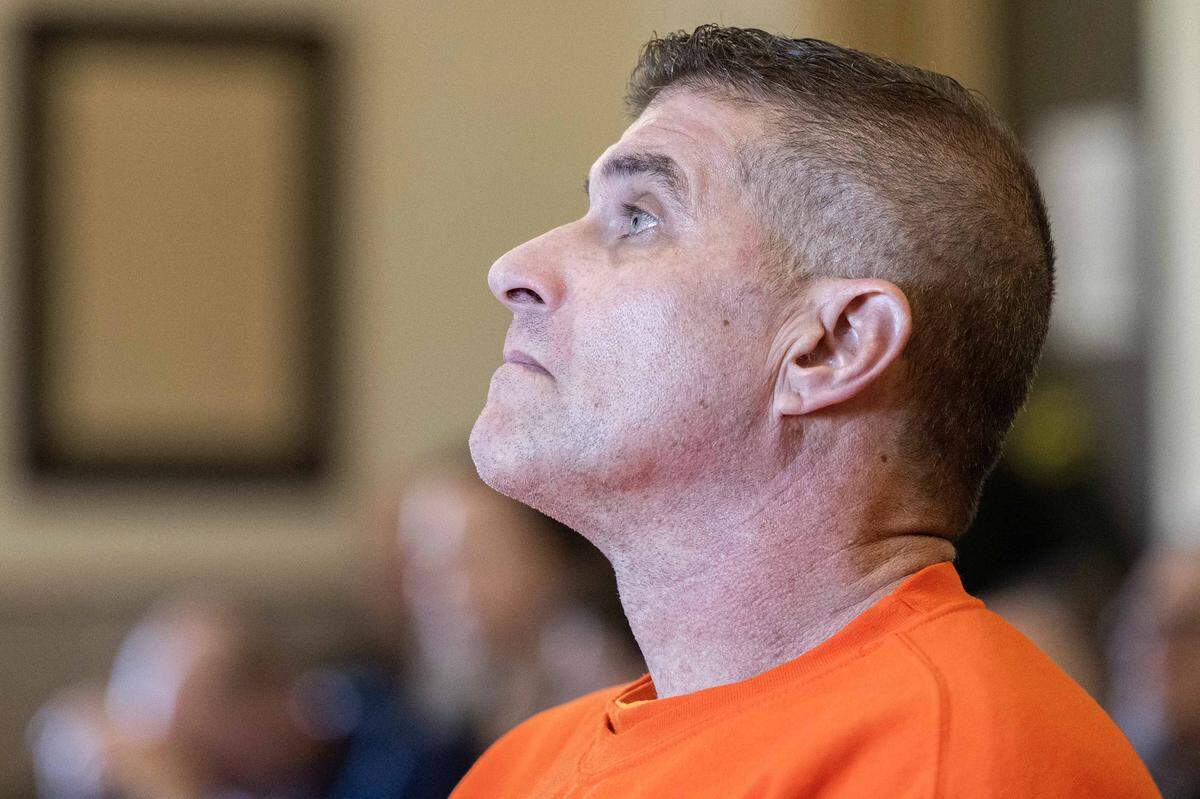 Former MLB pitcher Daniel Serafini looks up as he is sentenced for murdering his father-in-law and shooting his mother-in-law, in Placer Superior Court in Auburn on Friday, Feb. 27, 2026.