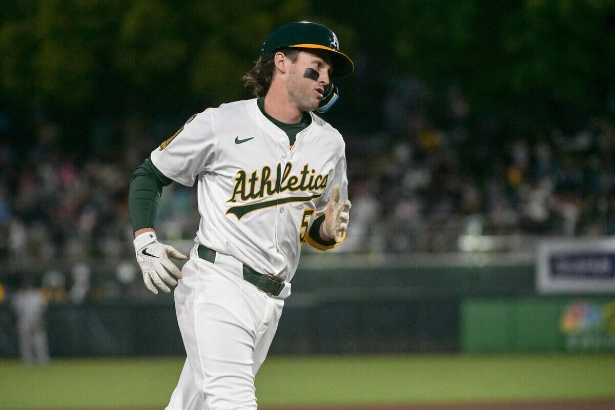 Apr 25, 2025; West Sacramento, California, USA; Athletics shortstop Jacob Wilson (5) rounds the bases after hitting a home run during the fifth inning against the Chicago White Sox at Sutter Health Park. Mandatory Credit: Ed Szczepanski-Imagn Images
