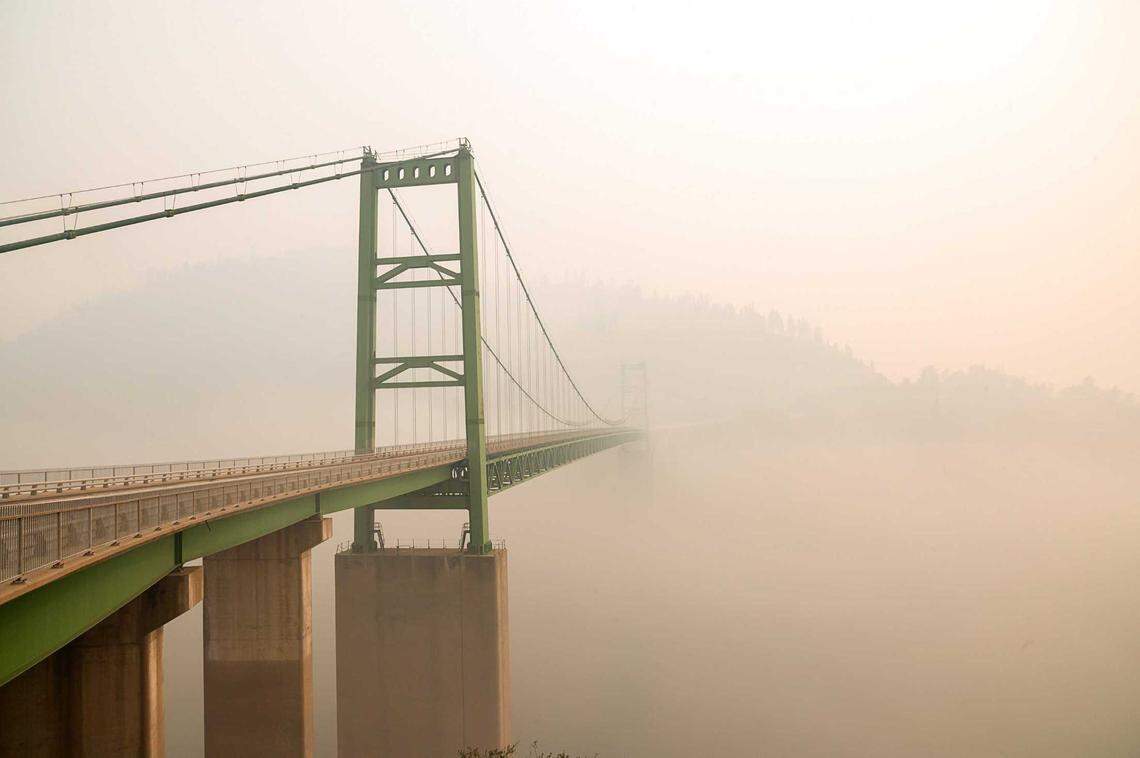 Smoke from the North Complex Fire obscures the air on Bidwell Bar Bridge as it cross Lake Oroville in 2020. Researchers at UC Davis say as wildfire activity has grown, the state’s pristine bodies of water have been affected by smoke.