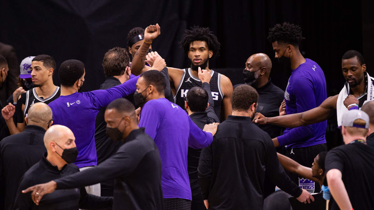 Sacramento Kings forward Marvin Bagley III (35), center, and teammates end a timeout during the fourth period against the Philadelphia 76ers at the NBA game Tuesday, Feb. 9, 2021, at Golden 1 Center in Sacramento. The 76ers beat the Kings 119-111.