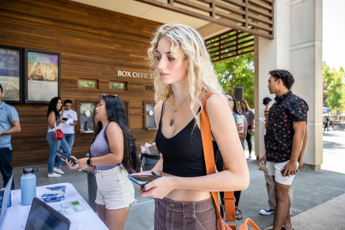 Georgia Harris, of Roseville checks into Sonoma State on Tuesday. While Rhonert Park was full of activity with new and transfer students moving in, the university has lost a fifth of its enrollment over the past few years.