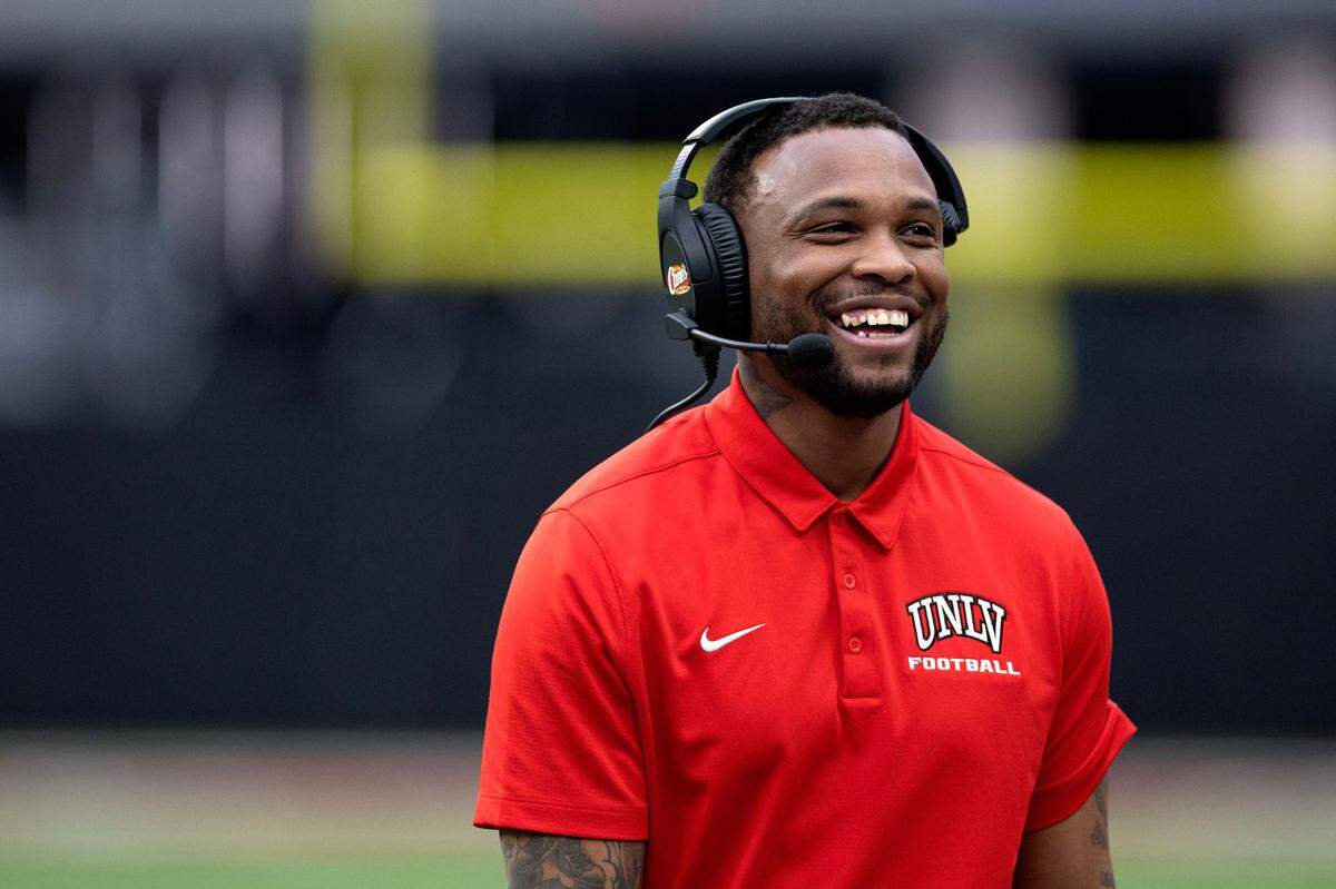UNLV offensive coordinator Brennan Marion laughs from the sidelines during the UNLV spring showcase game at Allegiant Stadium in Las Vegas in 2023. Marion is Sacramento State’s new football coach.