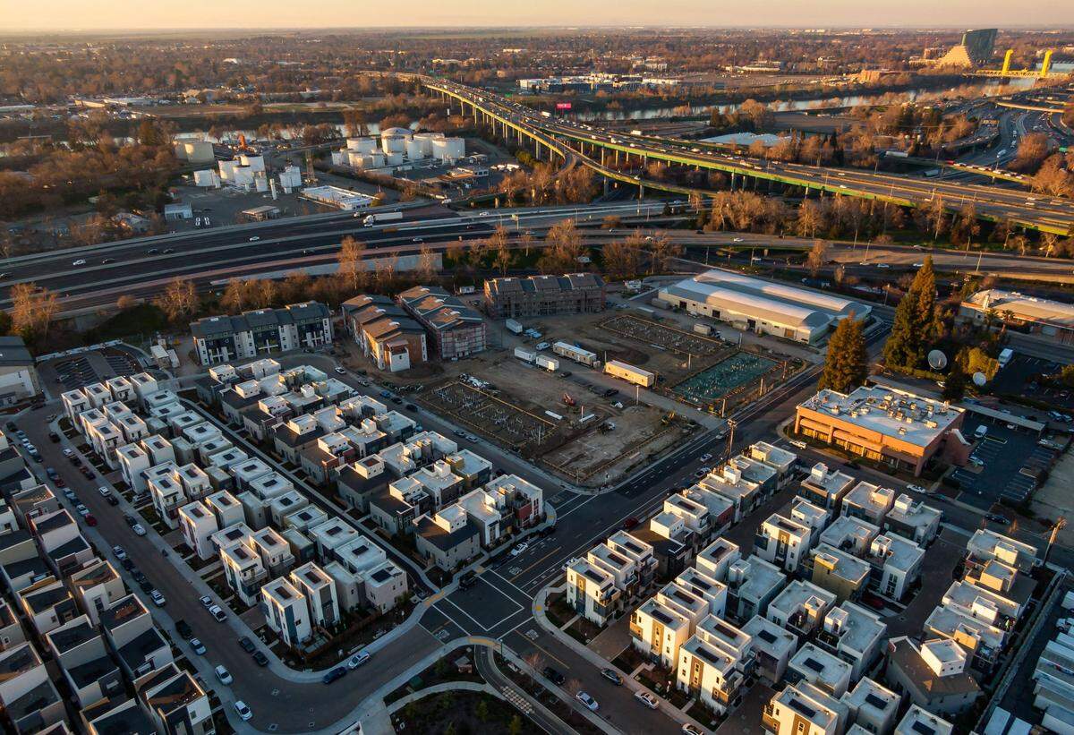 The final phase of housing construction is underway at The Mill at Broadway development, near the junction of Interstate 5 and the Capital City Freeway in Sacramento, in January. The units should be finished by next year.