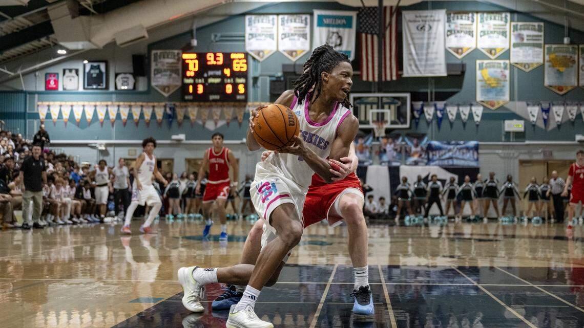 The Sheldon Huskies’ Baron Sabir is fouled in the second half in a CIF Sac-Joaquin Section Division I semifinal game against the Folsom Bulldogs on Tuesday in Vineyard.