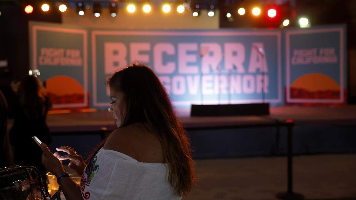 A supporter of California Democratic gubernatorial candidate Xavier Becerra attends his election night gathering at La Plaza de Cultura y Artes on Tuesday, June 2, 2026 in Los Angeles.