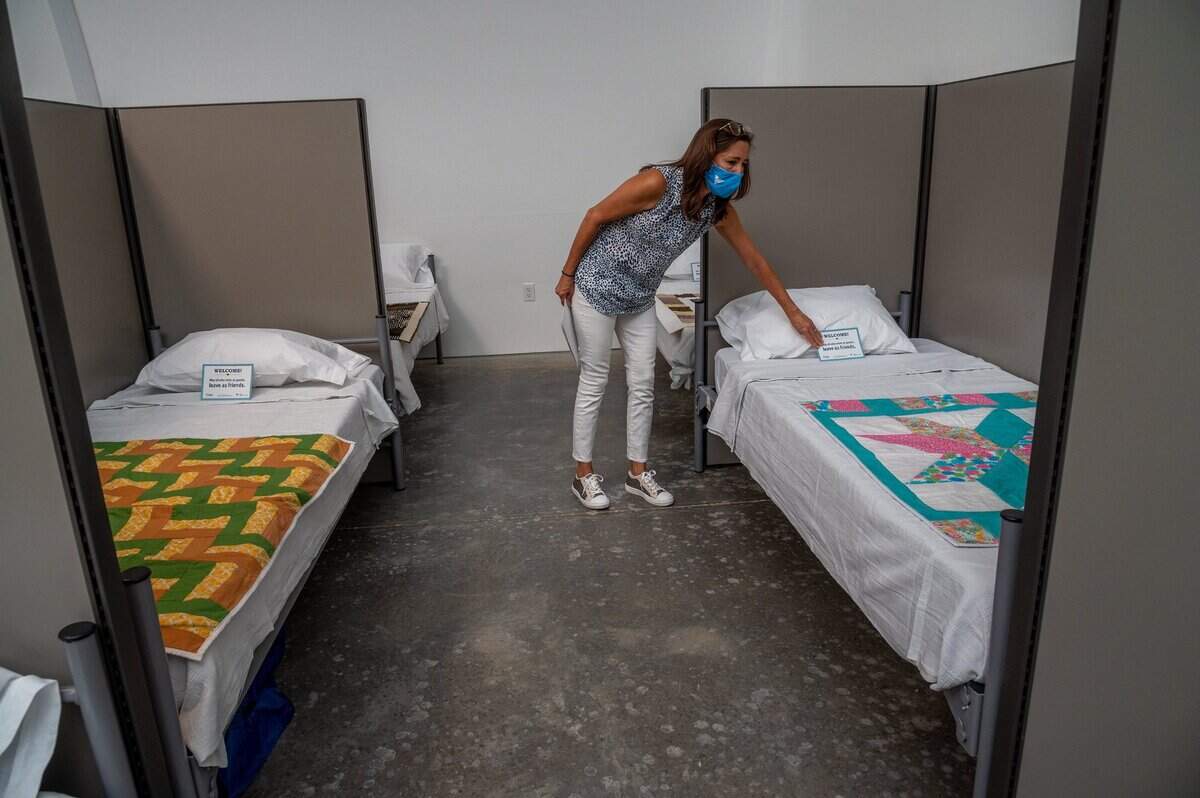 22. Christie Holderegger, spokeswoman for X Street Navigation Center shelter operator Volunteers of America, said local quilting groups provided the quilts to add more color and warmth for the homeless guests, while giving a tour of the inside of the living quarters at the on Tuesday, Sept. 14, 2021 in Sacramento. A shelter for up to 100 people experiencing homelessness, the center also will offer services such as life-skills classes, recovery assistance, medical care, financial counseling and housing-placement support to help clients transition into more permanent housing.Everyone single person that we talk to that comes in from the street has had some kind of trauma that has really impacted their soul and if they cant identify that and heal from that its really hard to move forward, Holderegger said.