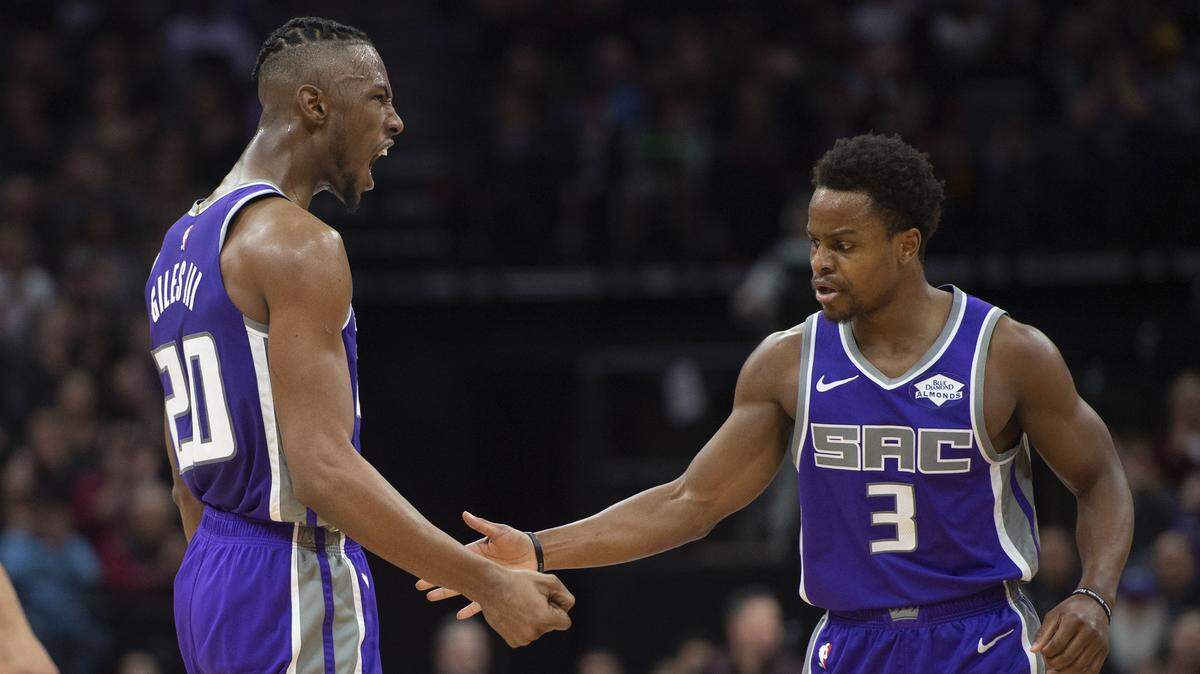 Kings forward Harry Giles, left, celebrates with guard Yogi Ferrell on Wednesday at Golden 1 Center.