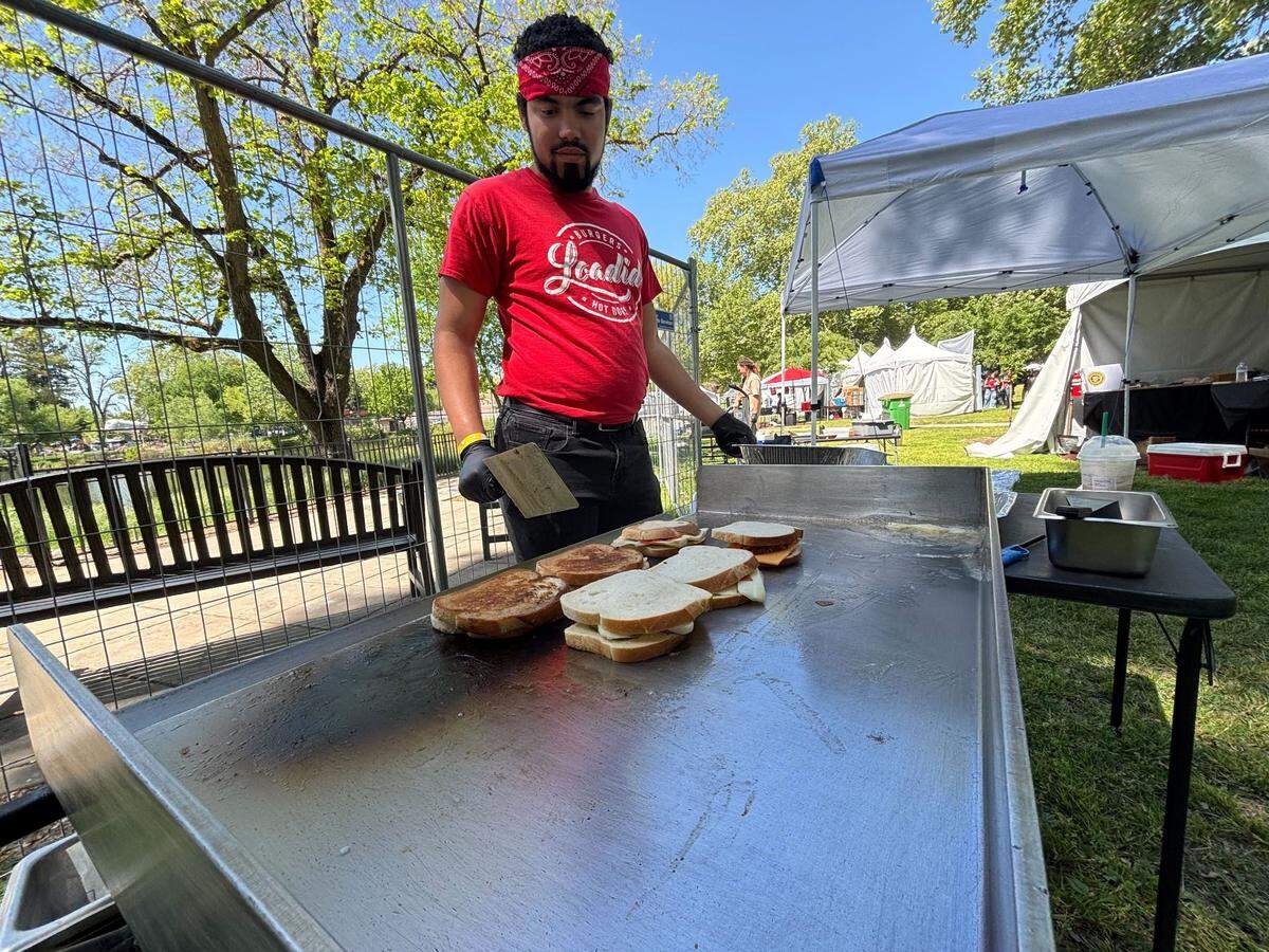 Dominick Jones of Loadid prepares grilled cheese sandwiches for the Sacramento Grilled Cheese Festival at Southside Park on Saturday, Apr. 12, 2025. Organizers for the festival announced on Jan. 26 that the festival has been postponed indefinitely. 