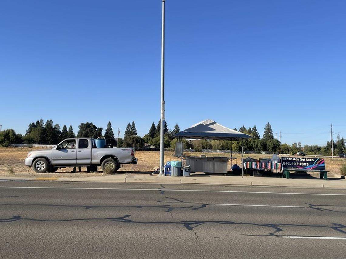 Street vendors begin to set up their operation in Elk Grove just before rush hour on Sept. 27, 2024. The Sacramento-suburb has routinely sent code enforcement to ensure their stands have permits.