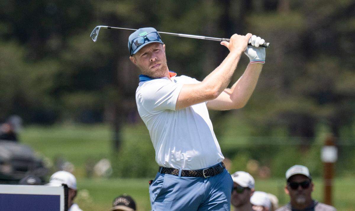 Former NHL All Star Joe Pavelski follows through on his swing during the final day of the American Century Championship celebrity golf tournament at Edgewood Tahoe Resort in Stateline, Nev., on Sunday, July 13, 2025.