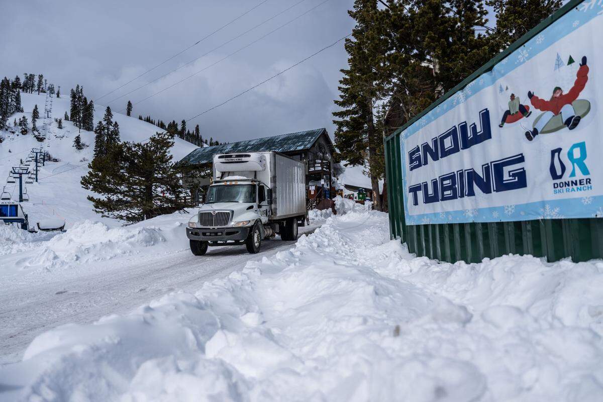 A Stohlgren Bros. truck makes a stop at Donner Ski Ranch earlier this month. Driver Holder said he has been busy making deliveries despite the heavy snow that fell in the area.