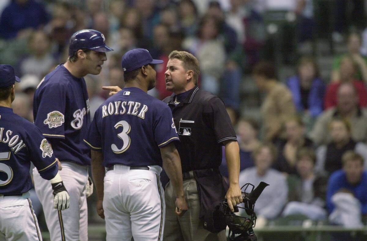 MILWAUKEE, WI - MAY 16: Manager Jerry Royster #5 and first baseman Richie Sexson #11 of the Milwaukee Brewers argue with home plate umpire Doug Eddings after Eddings threw both of them out of a game in the 4th inning against the Cincinnatti Reds at Miller Park in Milwaukee, Wisconsin. The Reds defeated the Brewers 2-1 in 11 innings. (Photo by Jonathan Daniel/Getty Images)