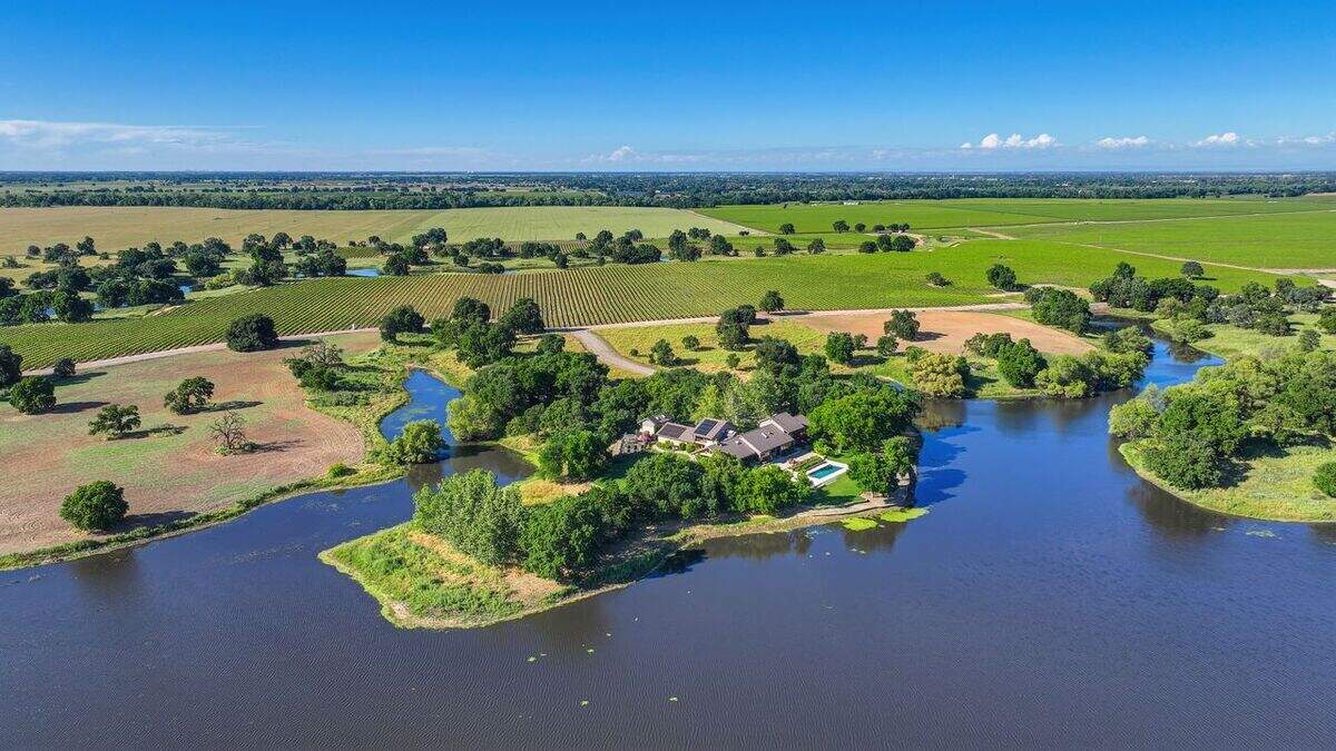 In Acampo, the 5,948-square-foot estate’s walls of glass frame a 180-acre lake and riparian forest. The four-bedroom, five-bathroom home is for sale for $4.25 million.