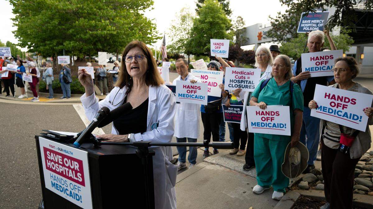 Dr. Kimberly Buss raises her concerns during a “Save Our Hospitals” rally on Tuesday, May 13, 2025, at Folsom’s Dignity Health Mercy Hospital about the potential impact of Medicaid cuts on health care services.