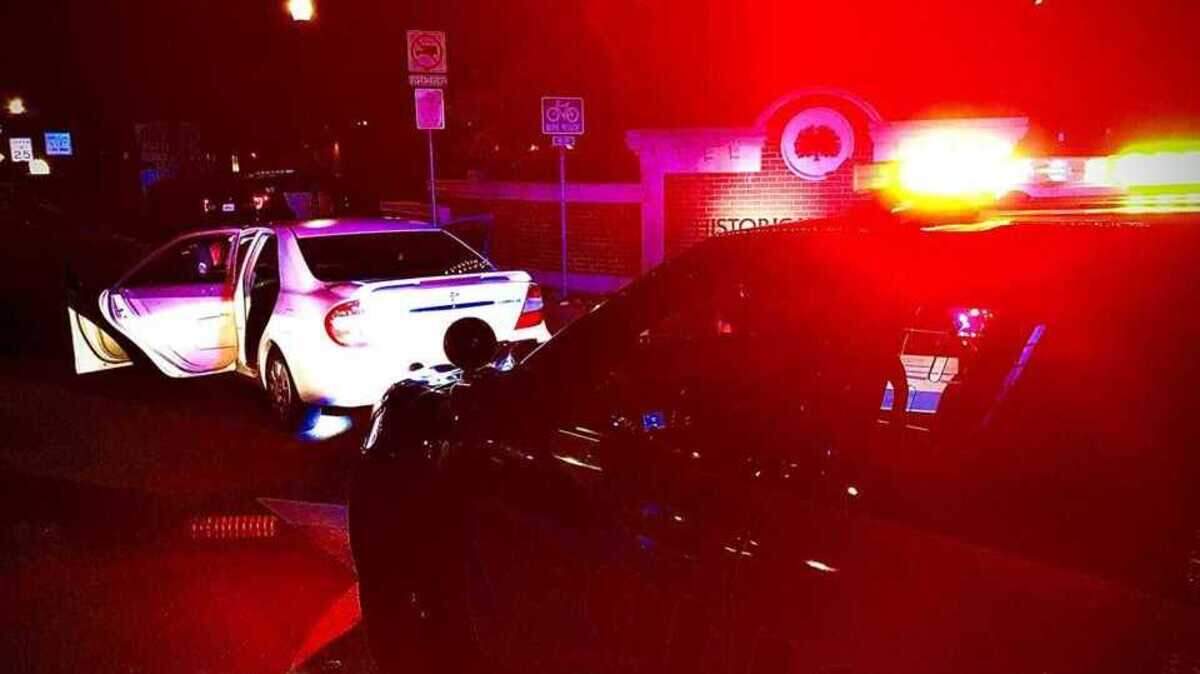 Police officers arrested two people Friday April 10, 2020, after the suspects were found in a car with two loaded guns in a car driving away from College Street, where a possible shooting was reported in Woodland, California.