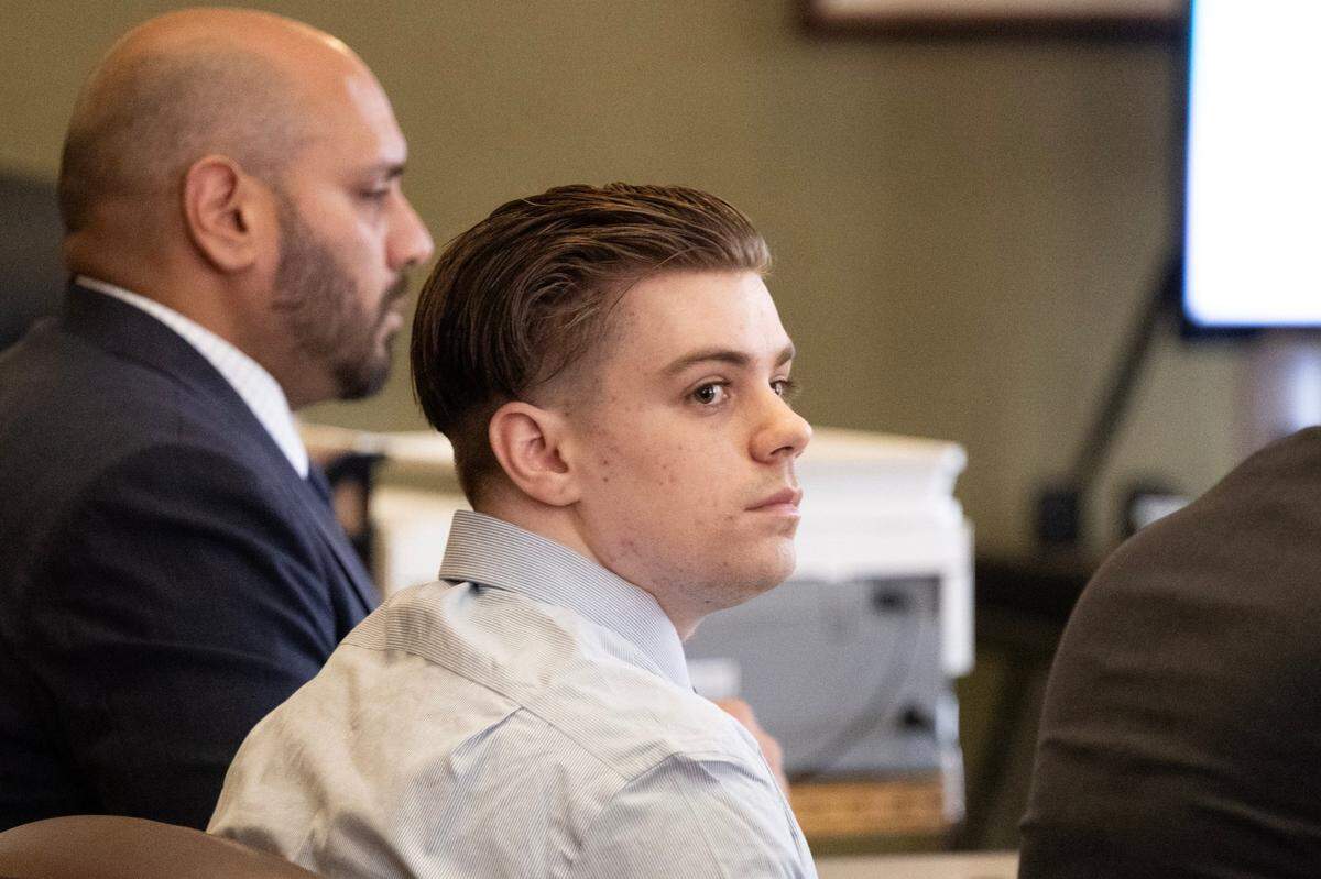 Defendant Carson David Schewe, center, listens during opening statements in the region’s first fentanyl murder jury trial on Monday, Feb. 26, 2024, in Placer Superior Court in Auburn. Schewe, 20, is charged with murder and two drug counts after allegedly selling fentanyl to Kade Kristopher Webb in December 2021.