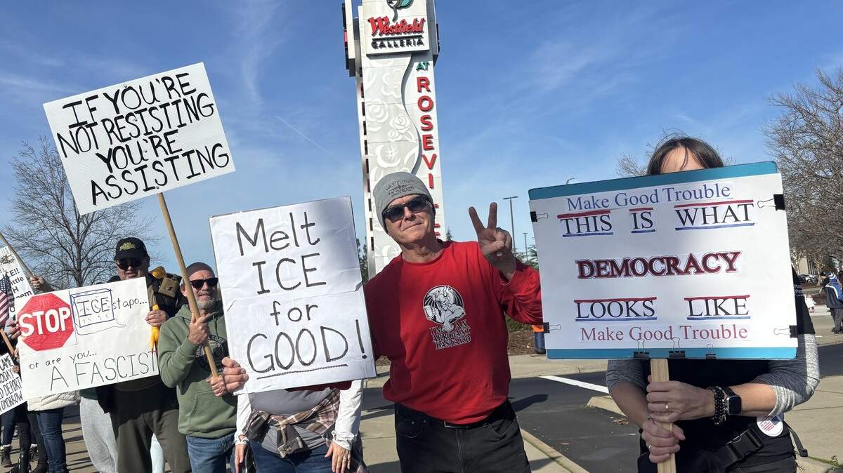 Protesters outside the Westfield Galleria mall in Roseville hold signs protesting U.S. Immigration and Customs Enforcement on Saturday, Jan. 10, 2026, after an ICE agent fatally shot a woman earlier in the week in Minneapolis. Letters defending Roseville protesters argue that vocal opposition to the Trump administration is justified amid Gaza casualties and political scandals.