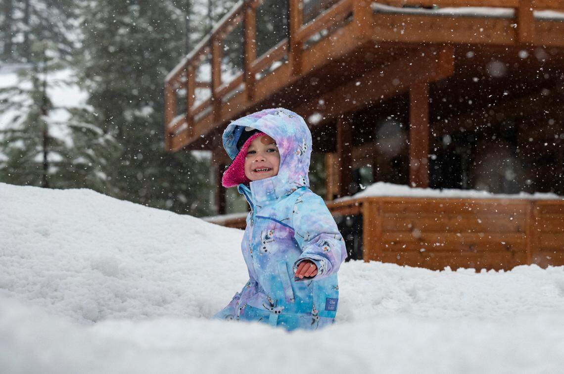 Madelyn Karimoto, 3, of Walnut Creek plays in the snow in Tahoma earlier this month as storms brought abundant snowfall to the Sierra Nevada.