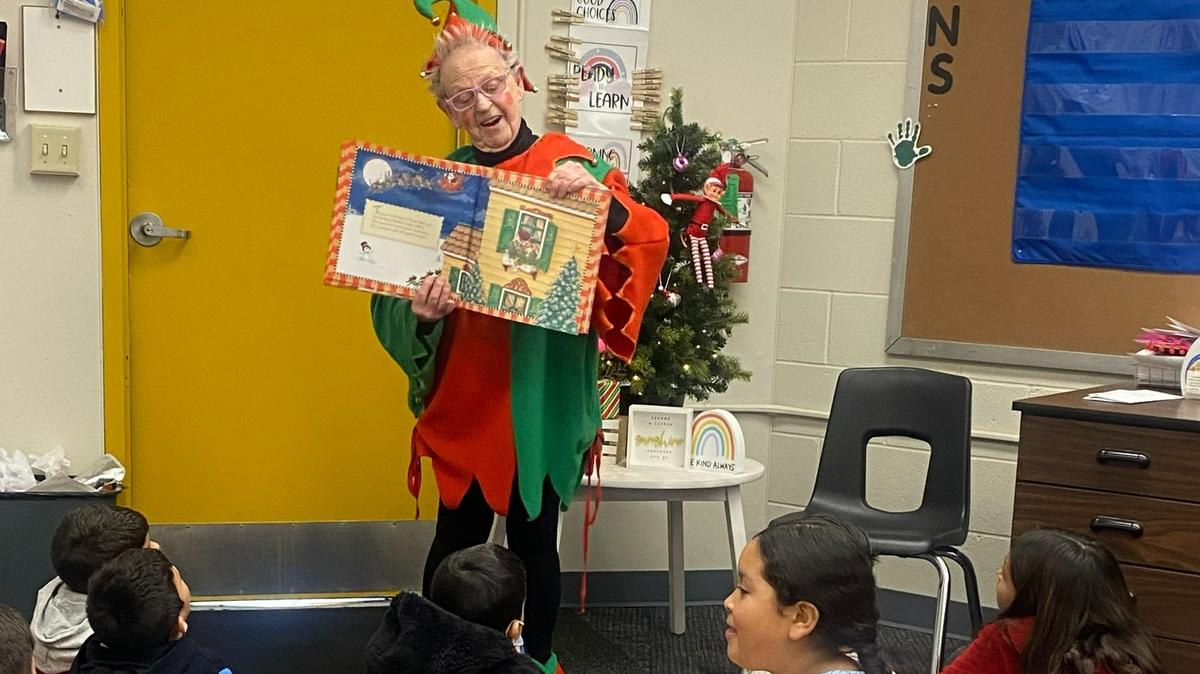 Bunny Stevens spreads Christmas cheer dressed up as an elf.