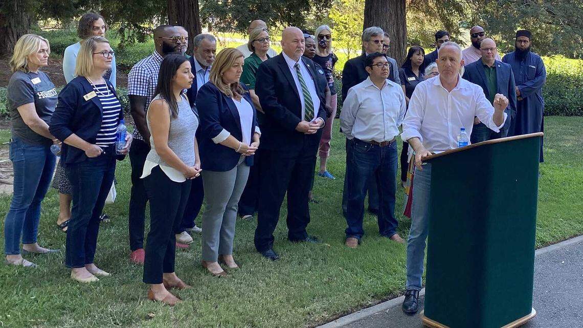 Sacramento Mayor Darrell Steinberg, right, speaks with other government leaders and Sacramento State President Robert S. Nelsen speak Friday, Sept. 2, 2022, after two anti-Semantic symbols were seen at and near the campus.