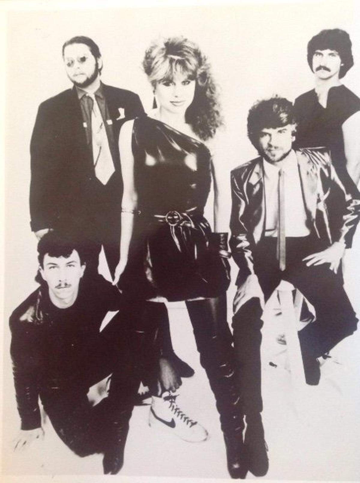 Kitty O’Neal, foreground, and Kurt Spataro, seated at right, played together in the 1980s band Secret Service.
