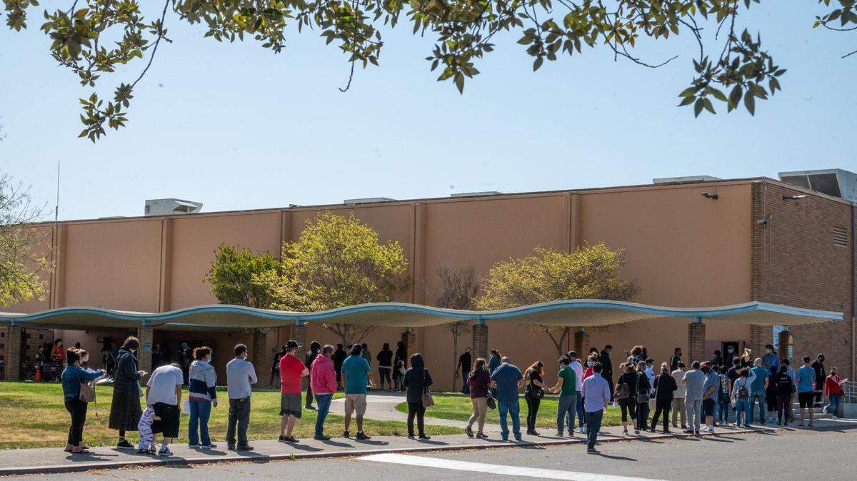 People who arrived expecting to receive the Johnson & Johnson COVID-19 vaccine at Burbank high school on Tuesday, April 13, 2021, were notified the clinic had to switch to the Pzifer vaccine after the J&J vaccine was paused, as federal officials investigate a handful of reports of severe blood clots in recipients. Public health officials see the vaccine as vital to reversing worrisome infection rates in the Sacramento region.