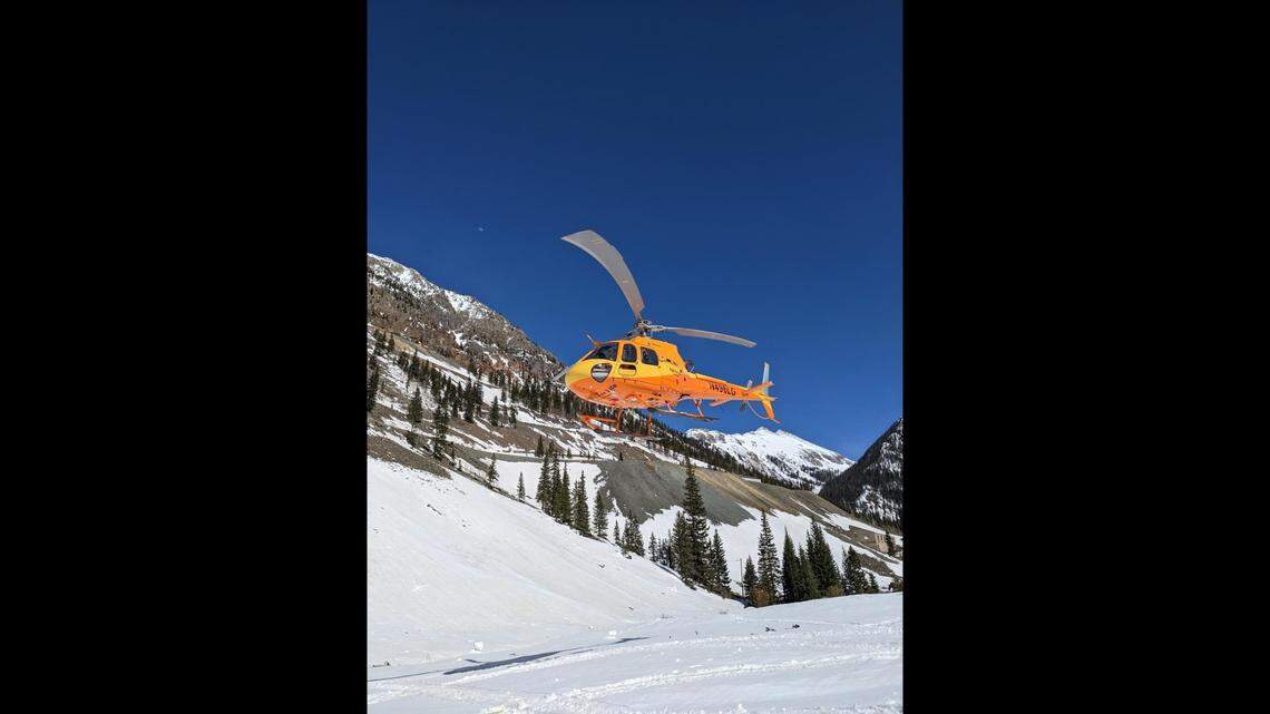 An avalanche swept up two skiers, leaving one with critical injuries, near Silverton, Colorado rescuers say.
