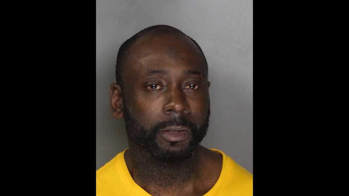 Brian Hicks, 42, was arrested on suspicion of auto burglary, assault on an officer, and narcotics charges after a scuffle injured two Sacramento police officers.
