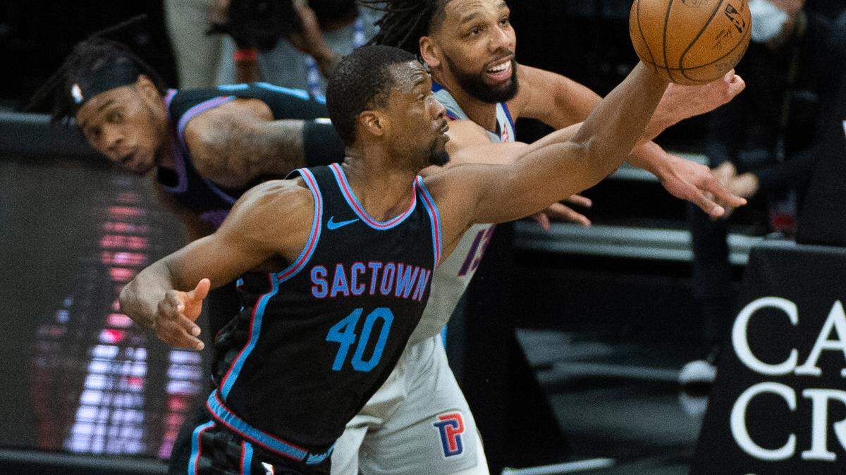 Sacramento Kings forward Harrison Barnes (40) battles Detroit Pistons center Jahlil Okafor (13) for rebound in the fourth quarter during a game at Golden 1 Center on Thursday, April 8, 2021 in Sacramento.