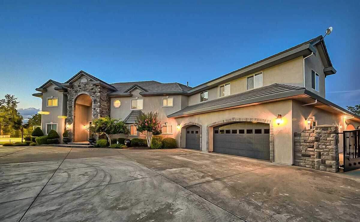 A 5,000-square-foot home is seen for sale on the real estate site Zillow.com that once belonged to John Crosby in Redding, Calif. Crosby and two other former officials of the Paskenta Band of Nomlaki Indians were sentenced in federal court in Sacramento for their part in a $47 million embezzlement scheme.
