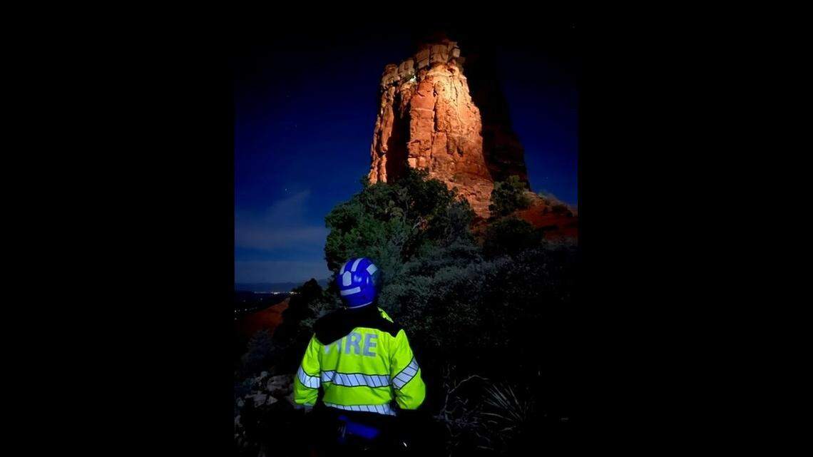 A rock climber became stranded on a spire 200 feet above ground after her leg got stuck in a crack, Arizona officials said. 