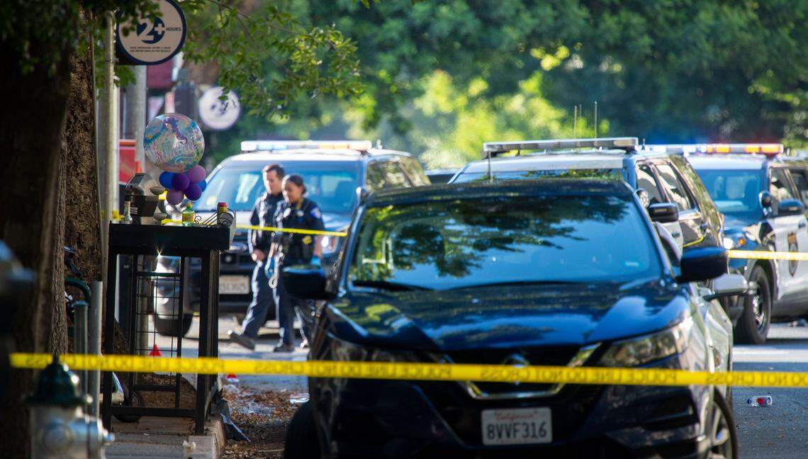 Birthday balloons show there was a celebration as Sacramento police investigate the scene outside the Mix nightclub at 16th and L streets in downtown Sacramento on Monday where multiple victims were shot. It was the second mass shooting at a downtown entertainment area in three months.