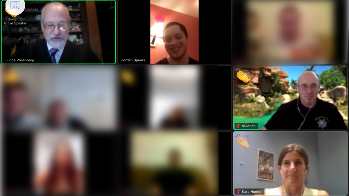 Jordan Spears, top center, appears in a Zoom conference call upon graduating from Yolo County’s Addiction Intervention Court. The Woodland man battled drug addiction and was at times homeless. 