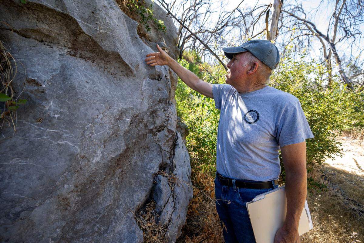 Jim Wood, a board member with the nonprofit Colfax Lime Kiln Preserve, describes last month how limestone was extracted at a historic quarry and kiln in Placer County.