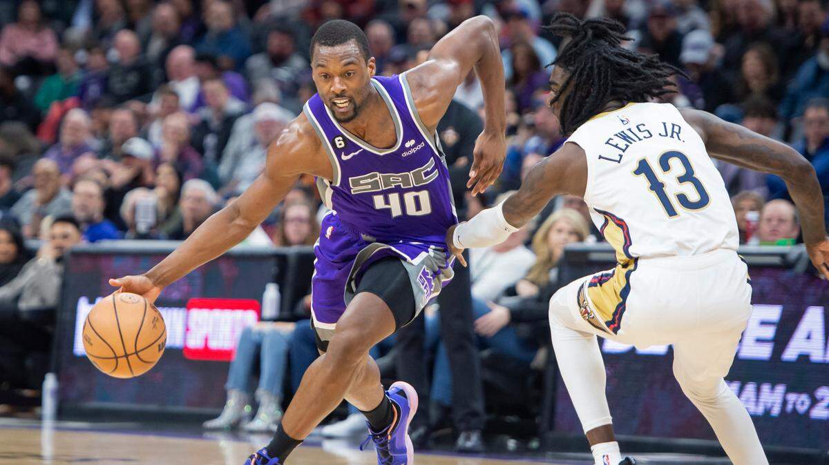 Sacramento Kings forward Harrison Barnes (40) drives to the basket with New Orleans Pelicans guard Kira Lewis Jr. (13) defending in the second half of the NBA basketball game Monday, March 6, 2023, at Golden 1 Center in Sacramento. Barnes had 14 points. The Kings defeated the Pelicans 123-108.