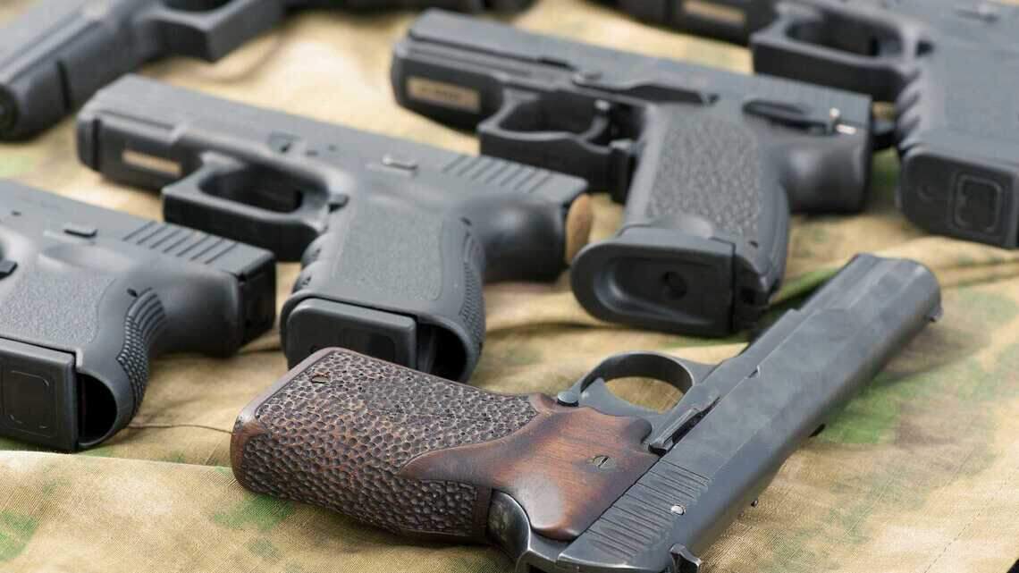 Feds: California gun dealer stole cops’ identities for illegal handgun sales