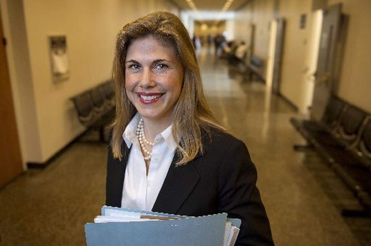 California Deputy Attorney General Maggy Krell stands in a hallway of the Sacramento courthouse in 2014, during her unsuccessful campaign for the office for Sacramento District Attorney.